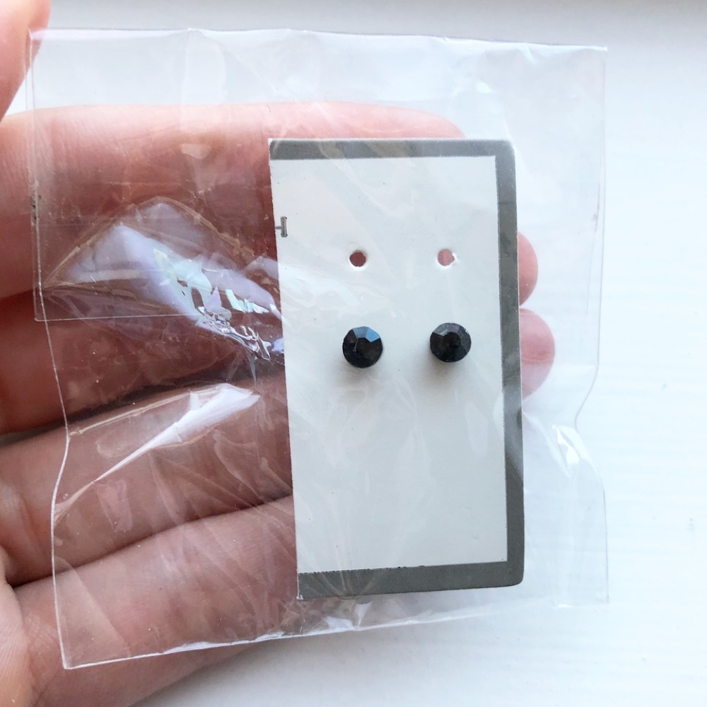 Tiny black multifaceted bead stud earrings